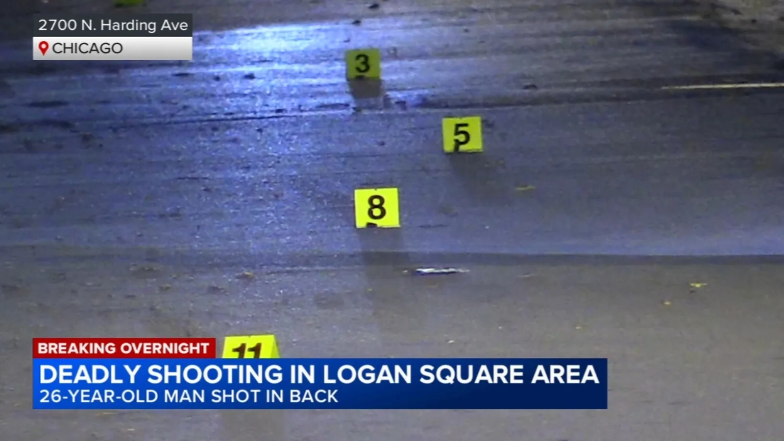 Chicago police tape near a street scene in Logan Square after a shooting