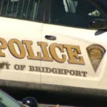 Bridgeport police vehicle at a crash scene on a residential street